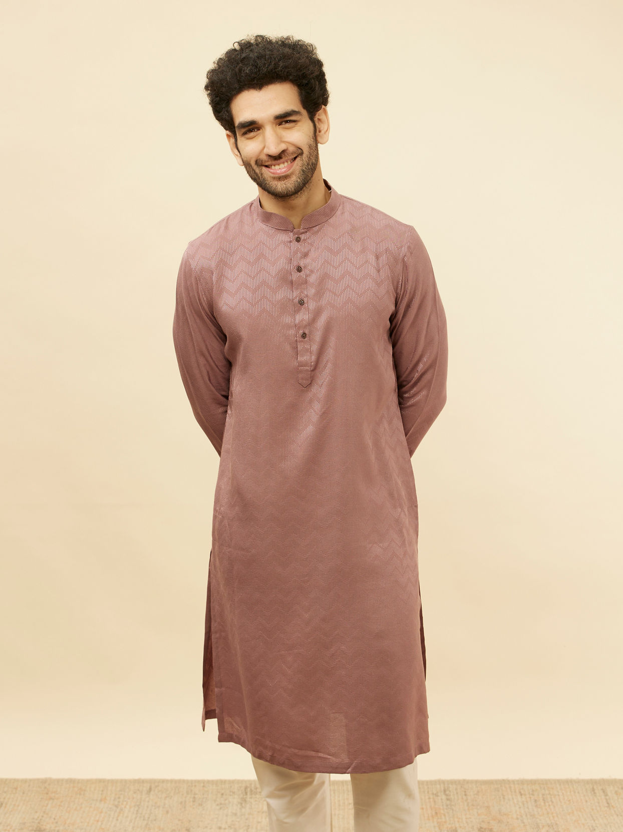 alt message - Manyavar Men Foxy Pink Chevron Patterned Kurta Set image number 0